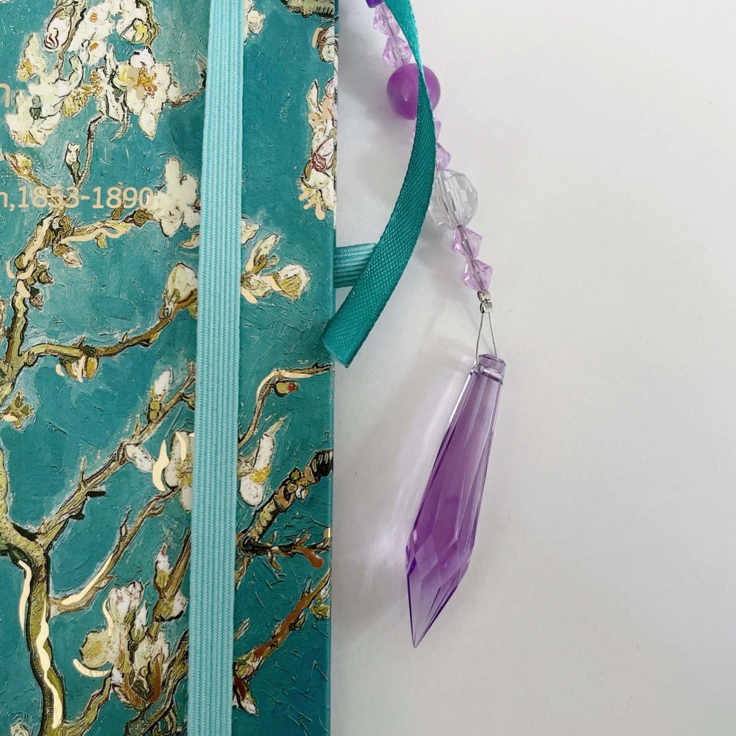 Detail view of the elastic and beaded bookmarks