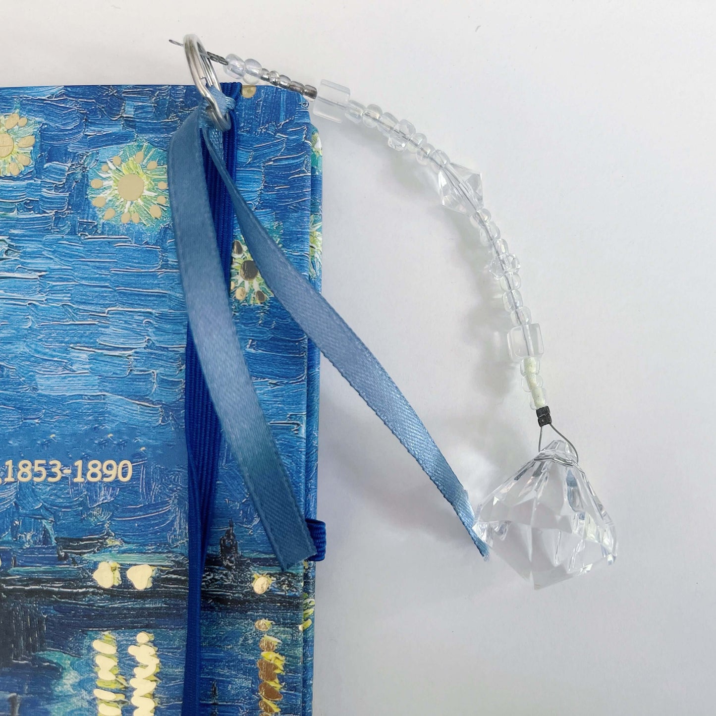 Detail view of the elastic and beaded bookmarks