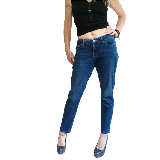 Front view of navy blue jeans, uniform coloration.