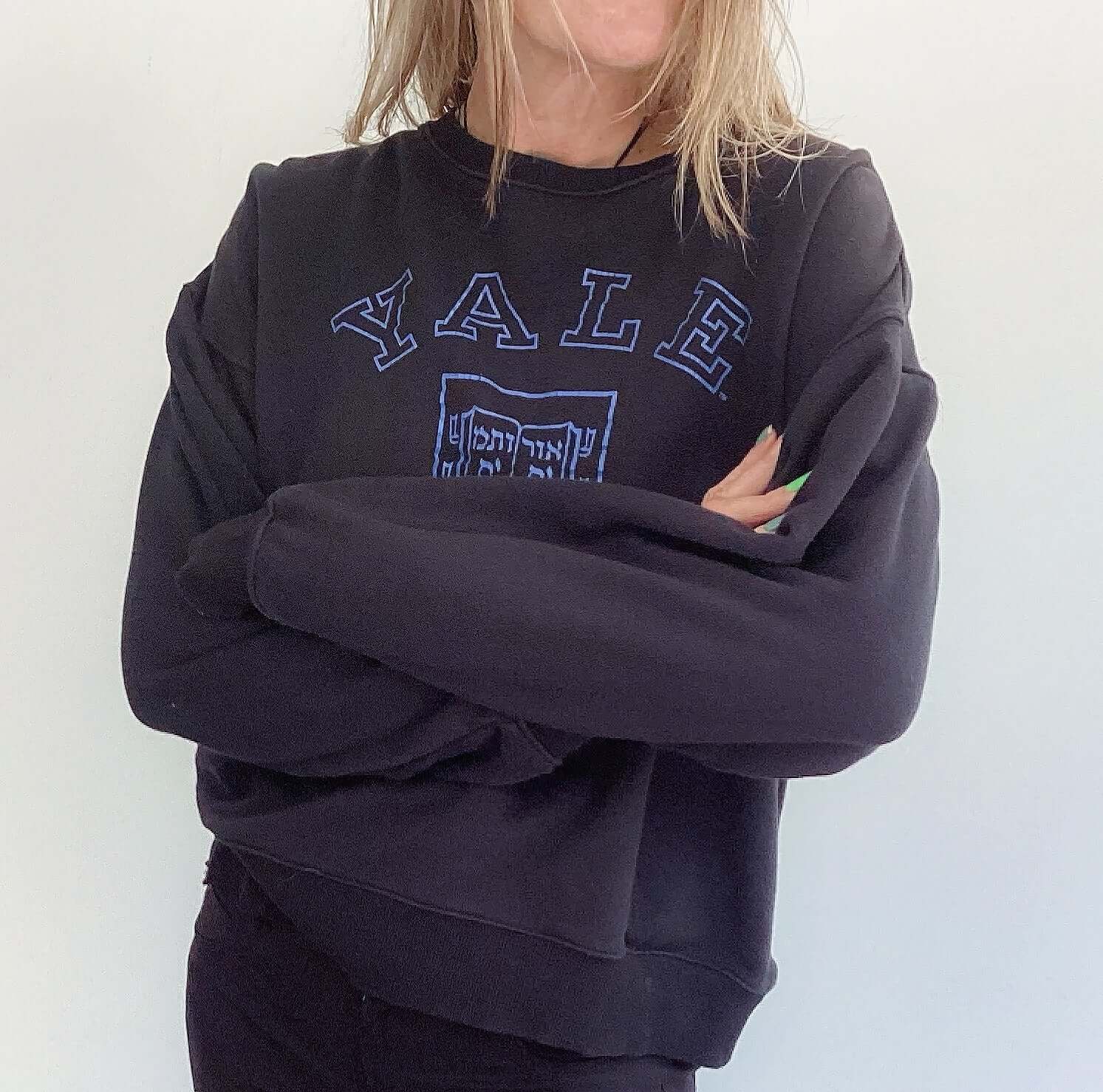 Front additional view of sweatshirt, print of yale and lux et veritas in blue, with hebrew writing beneath, hip length.