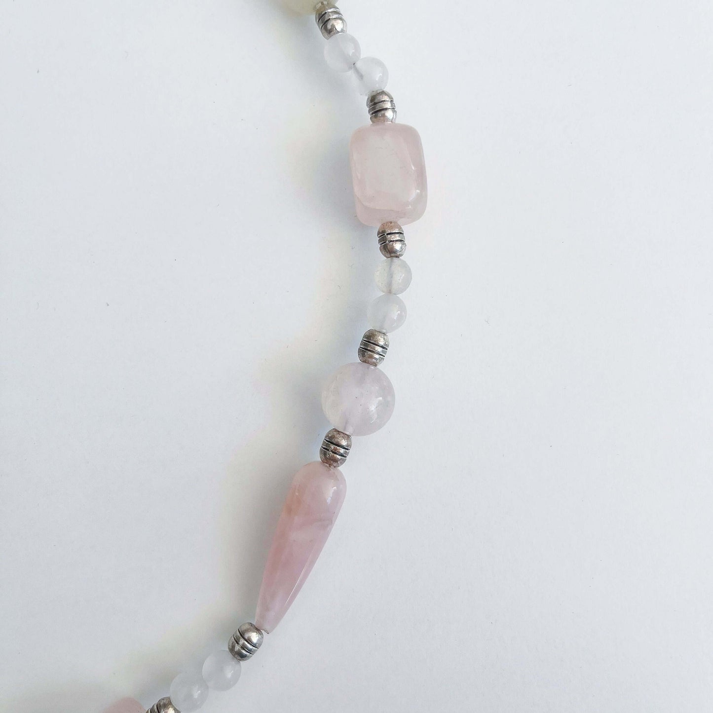 Detail view of the assorted size Rose Quartz beads.