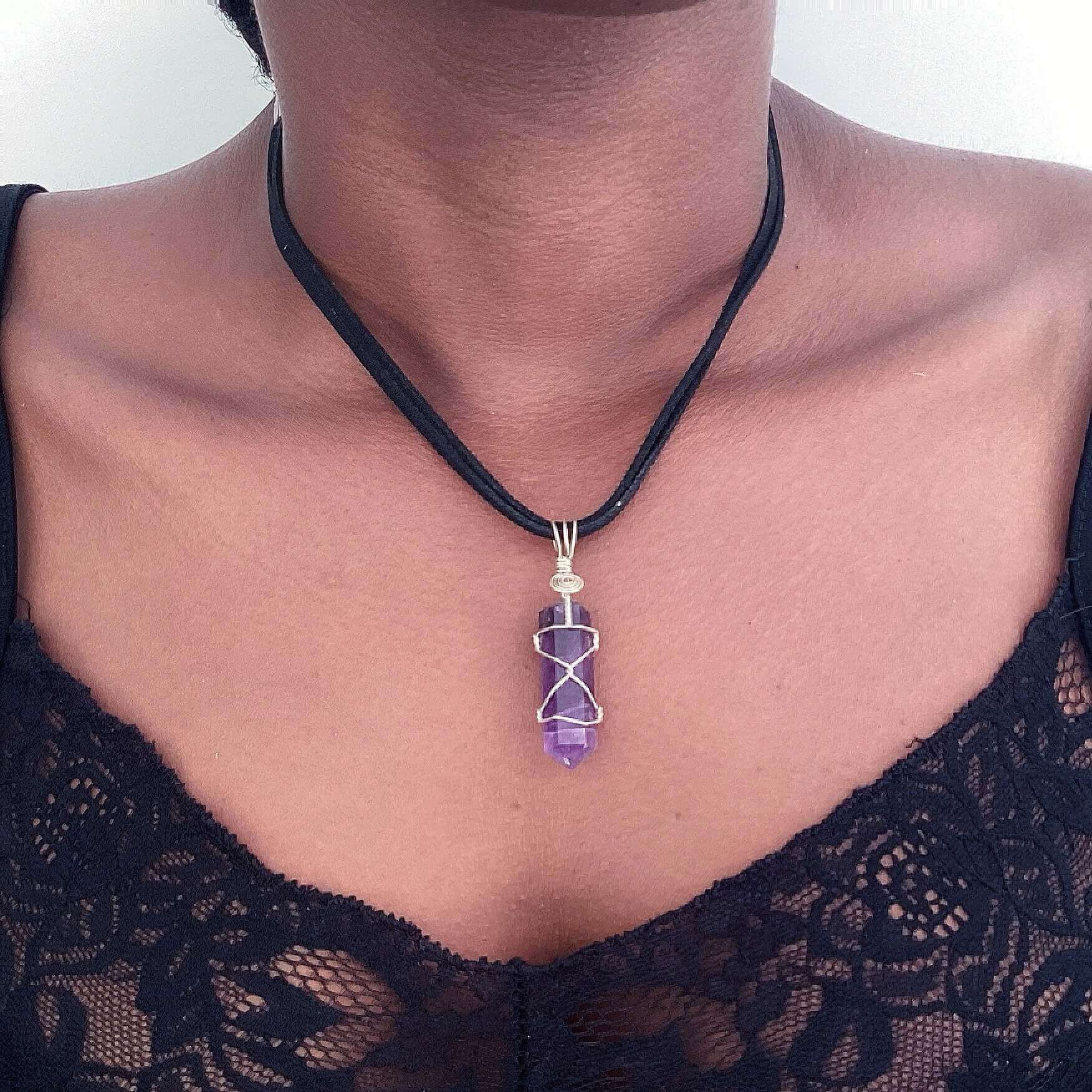 Silver wire bound cut and polished amethyst on choker.