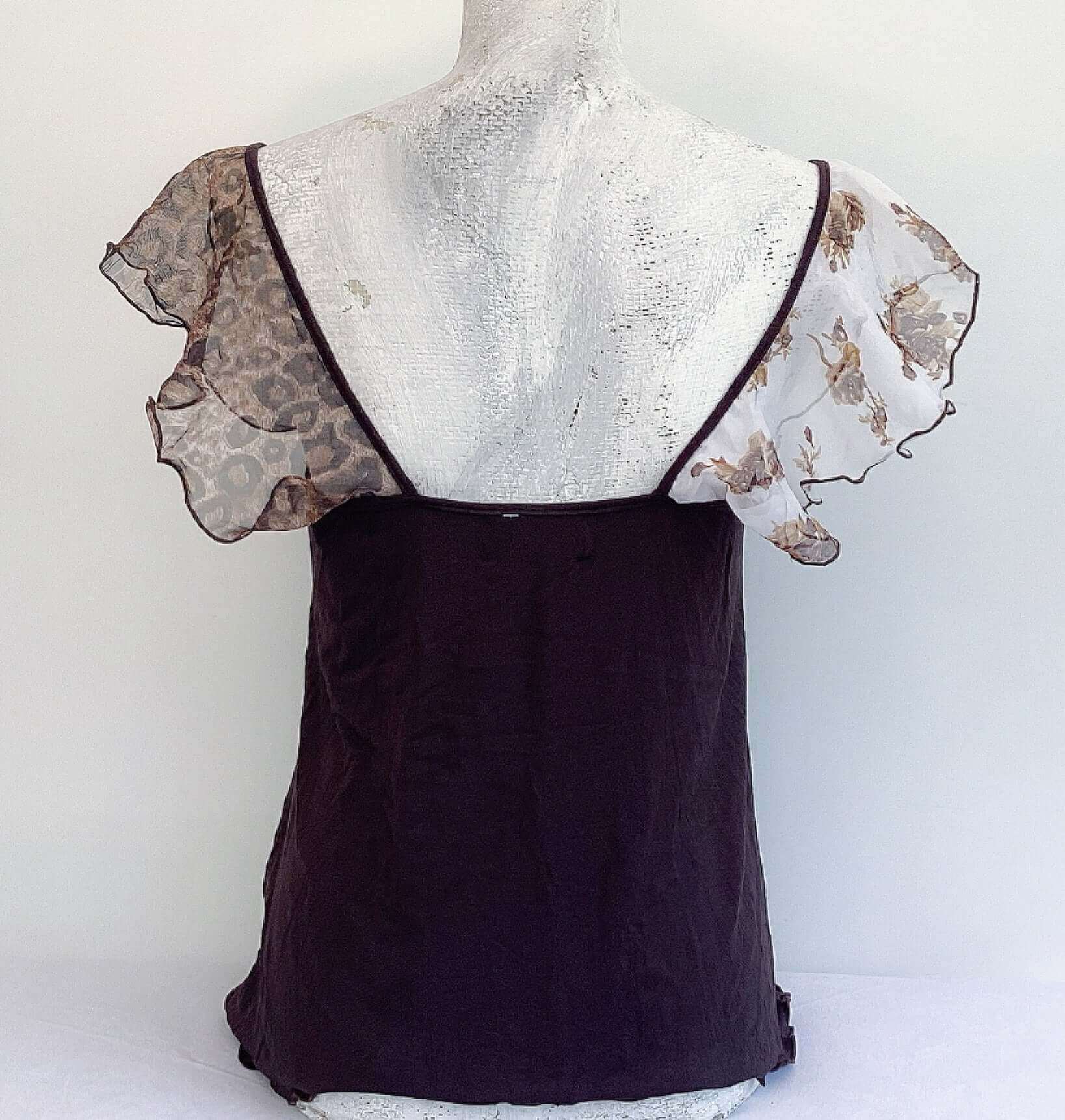 Back view of camisole, showing contrasting, patterned, wide chiffon frill straps.