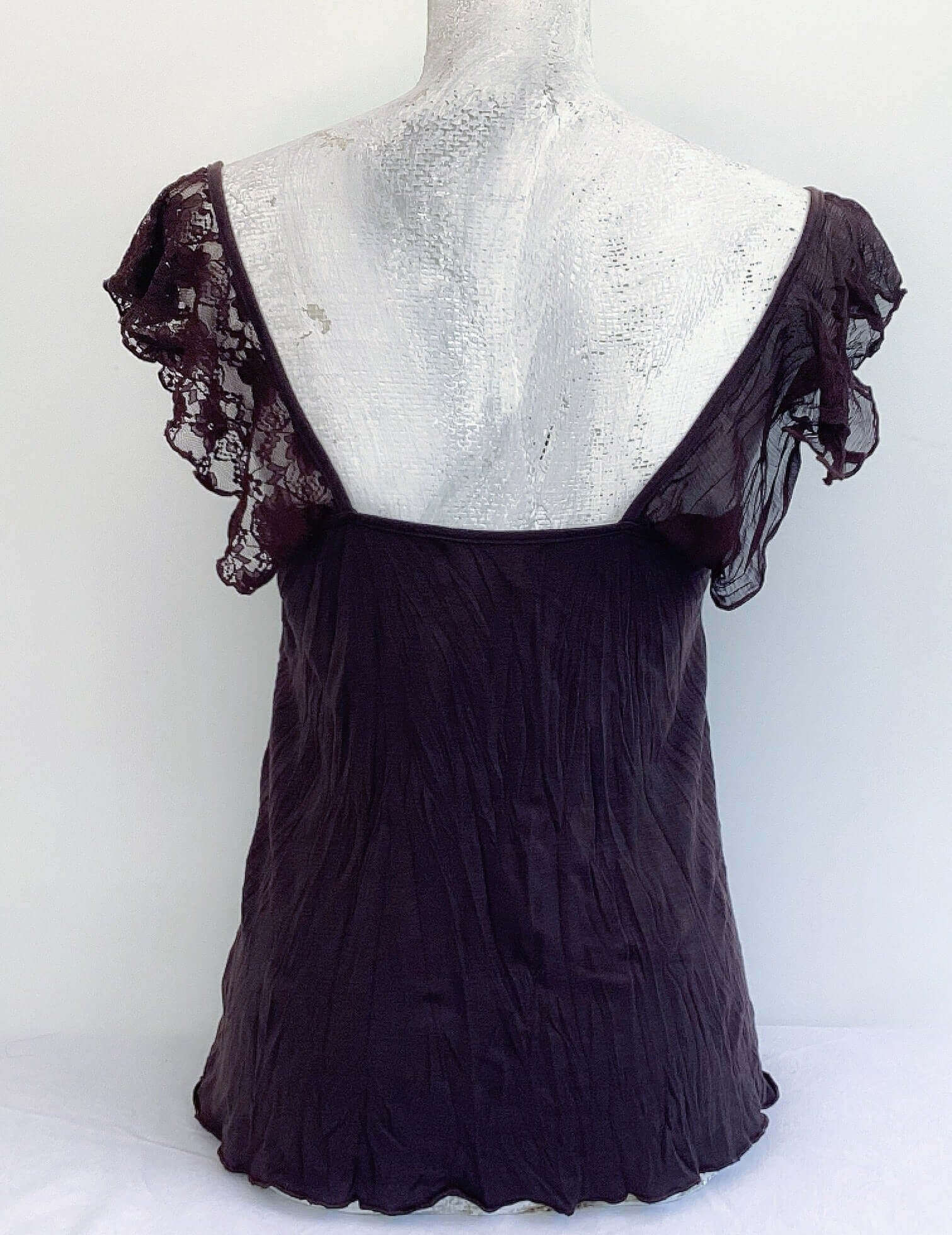 Back view of camisole, showing contrasting, patterned, wide chiffon frill straps.