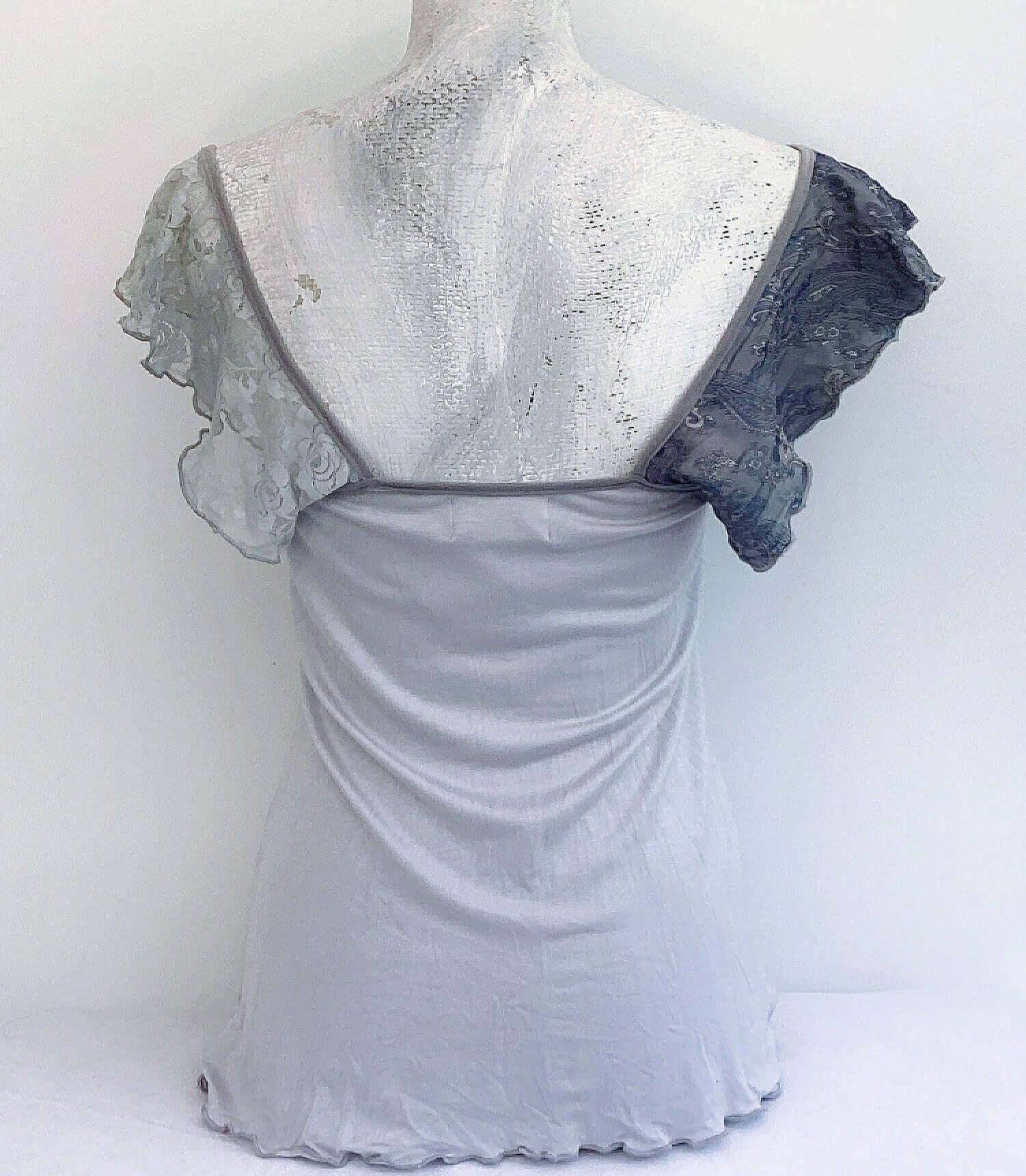 Back view of camisole, showing contrasting, patterned, wide chiffon frill straps.