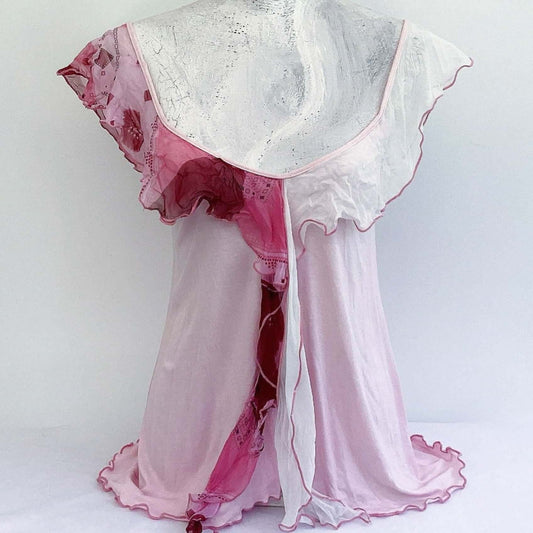 Front view of camisole, contrasting, patterned, wide chiffon frill straps, joining at center bust, flowing down in front.