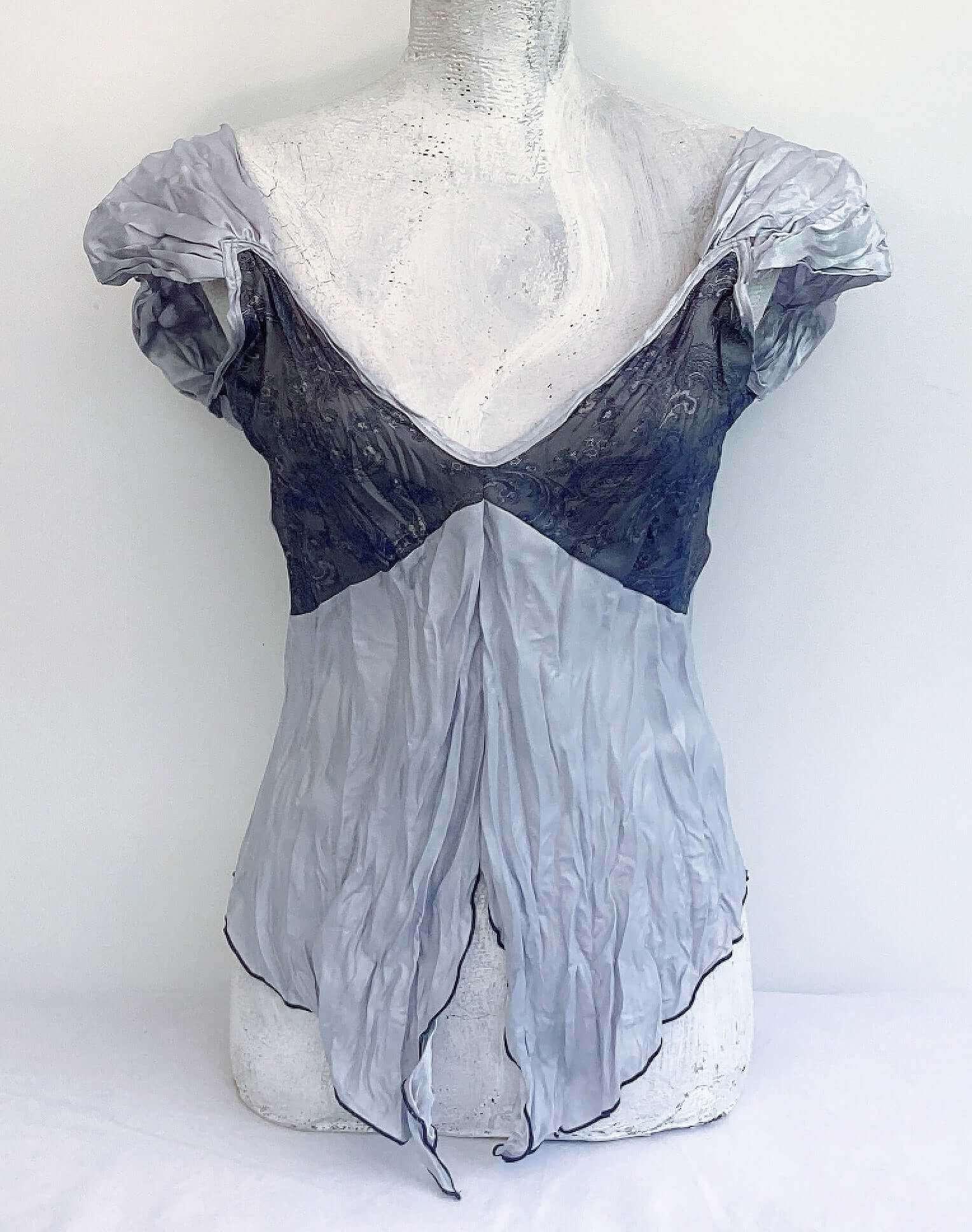 Front view grey camisole, contrasting blue grey paisley printed bust, with wide satin ruched straps, dark grey rolled hem.