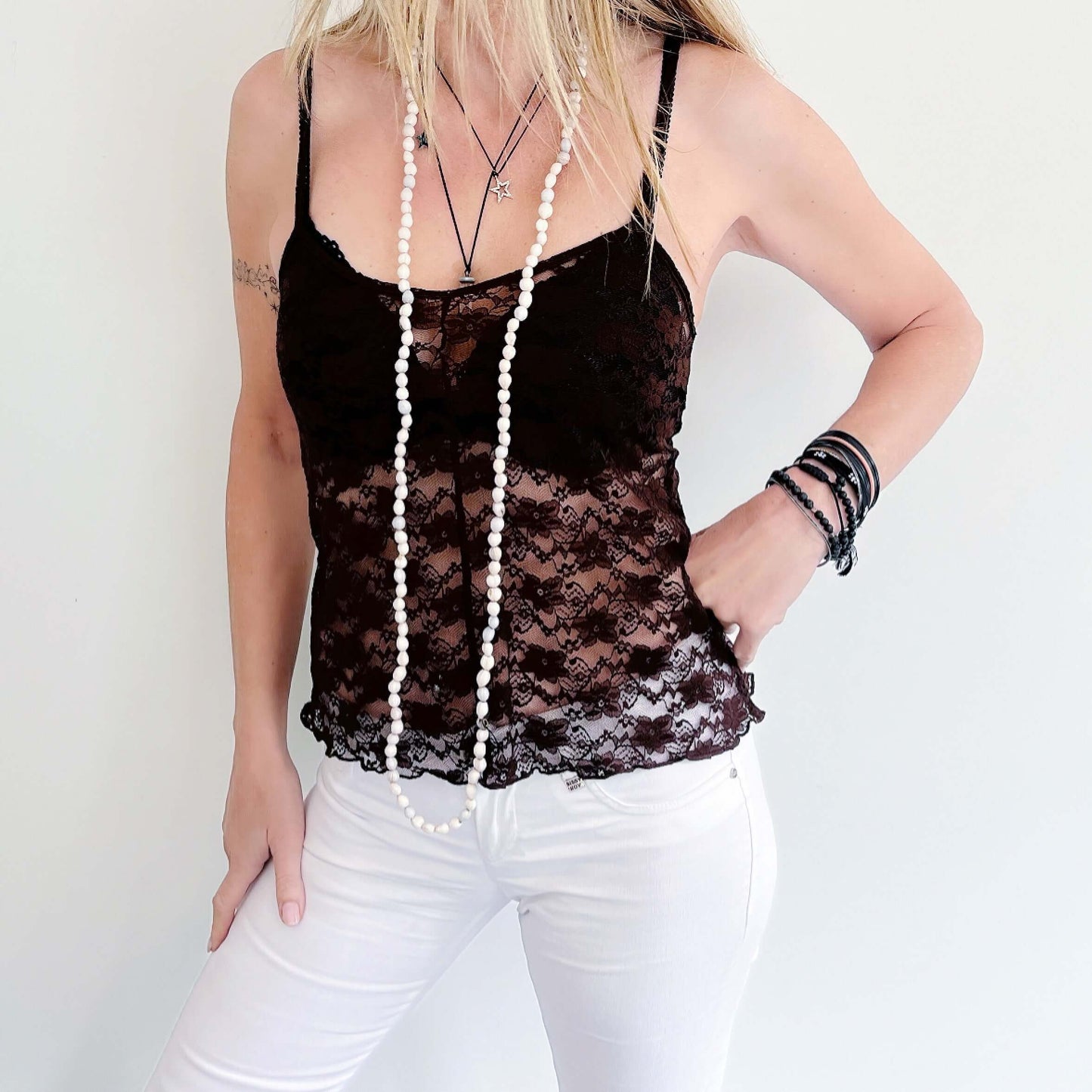 Front view of fitted brown stretch lace cami, waist length.