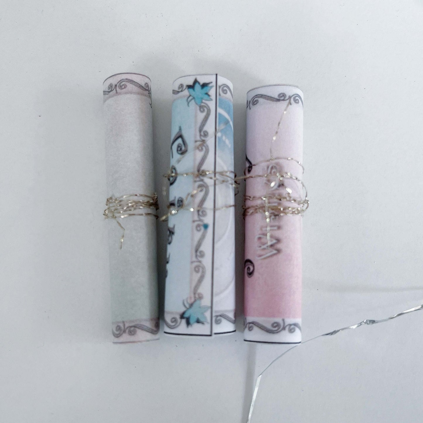 View of the three individually bound fairy scrolls.