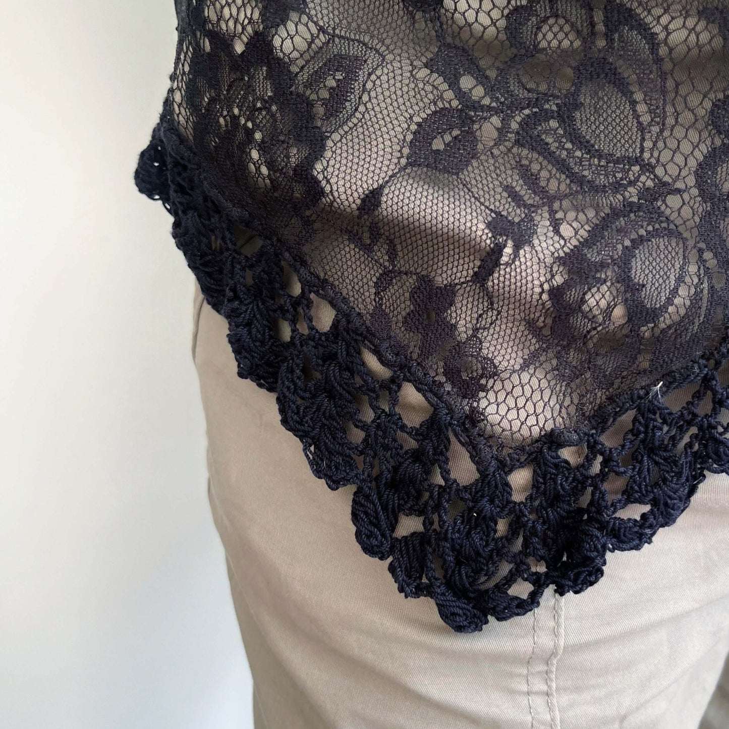 Detail view of black lace hem, with gorgeous black crochet.