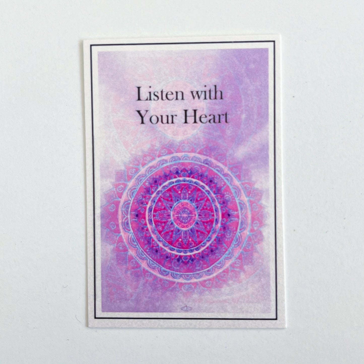Purple mandala sample card which reads, "listen with your heart"