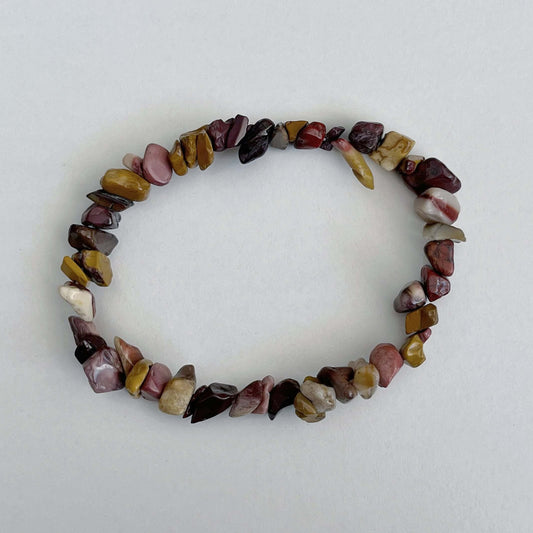 Top view of the tumbled semi-precious stones, vibrant shades of autumn leaves.