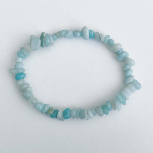 Top view of the tumbled semi-precious stones, subtle shades of aquamarine.