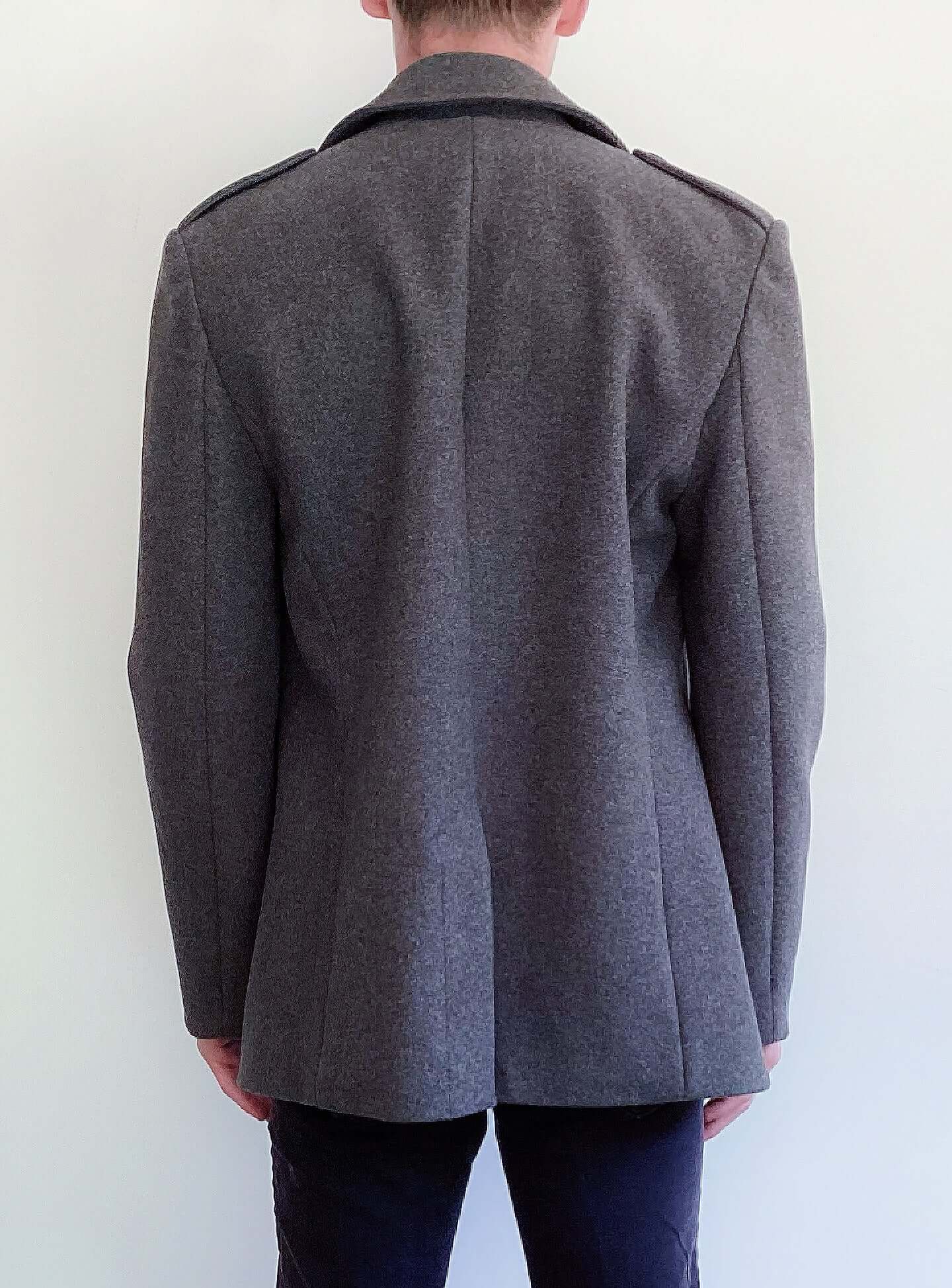 Grey wool formal coat, double-breasted, dark grey buttons, back view.