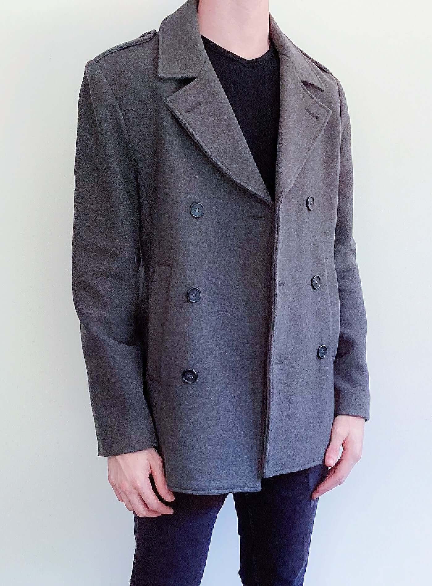 Grey wool formal coat, double-breasted, dark grey buttons, side view.