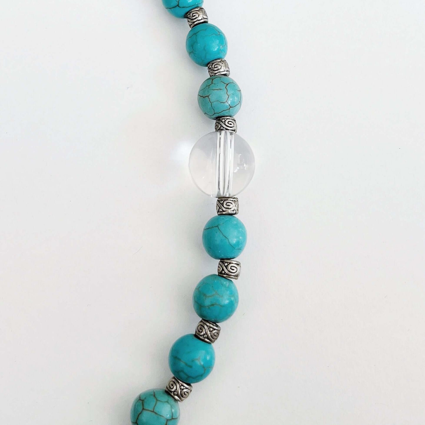 Detail view of the actual Blue Howlite and clear quartz beads, the latter is a slightly bigger size.