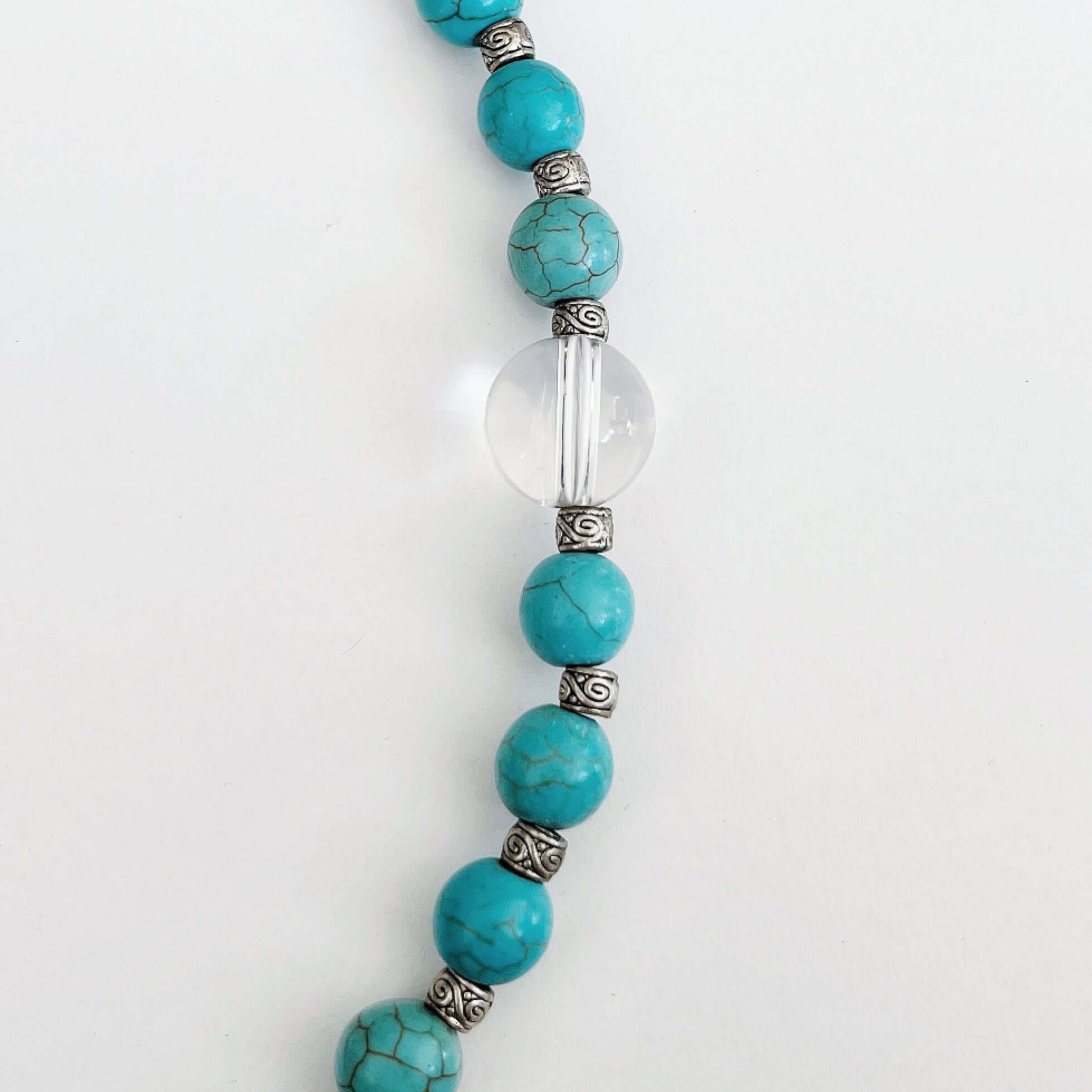 Detail view of the actual Blue Howlite and clear quartz beads, the latter is a slightly bigger size.