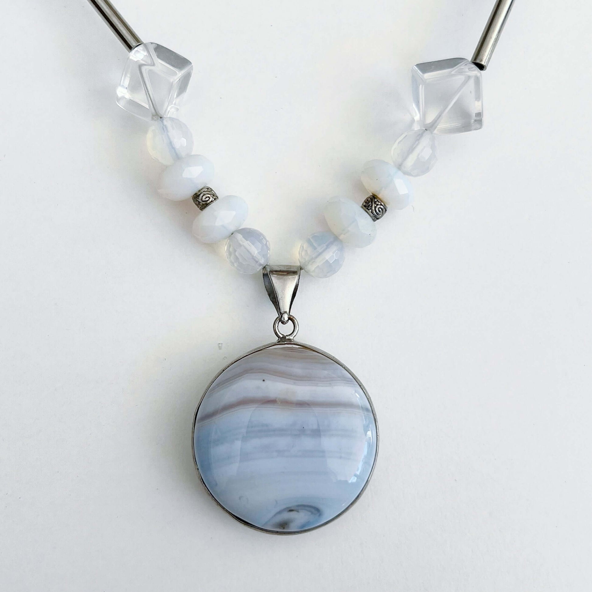 Detail view of the Blue Lace Agate pendant.