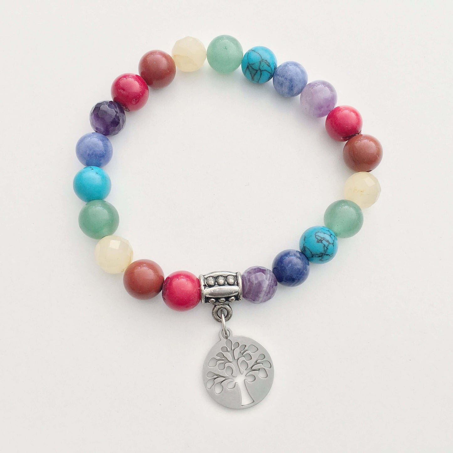 Top view of beaded bracelet with matching 3 bead dangle and Tree Of Life attached to silver bead.