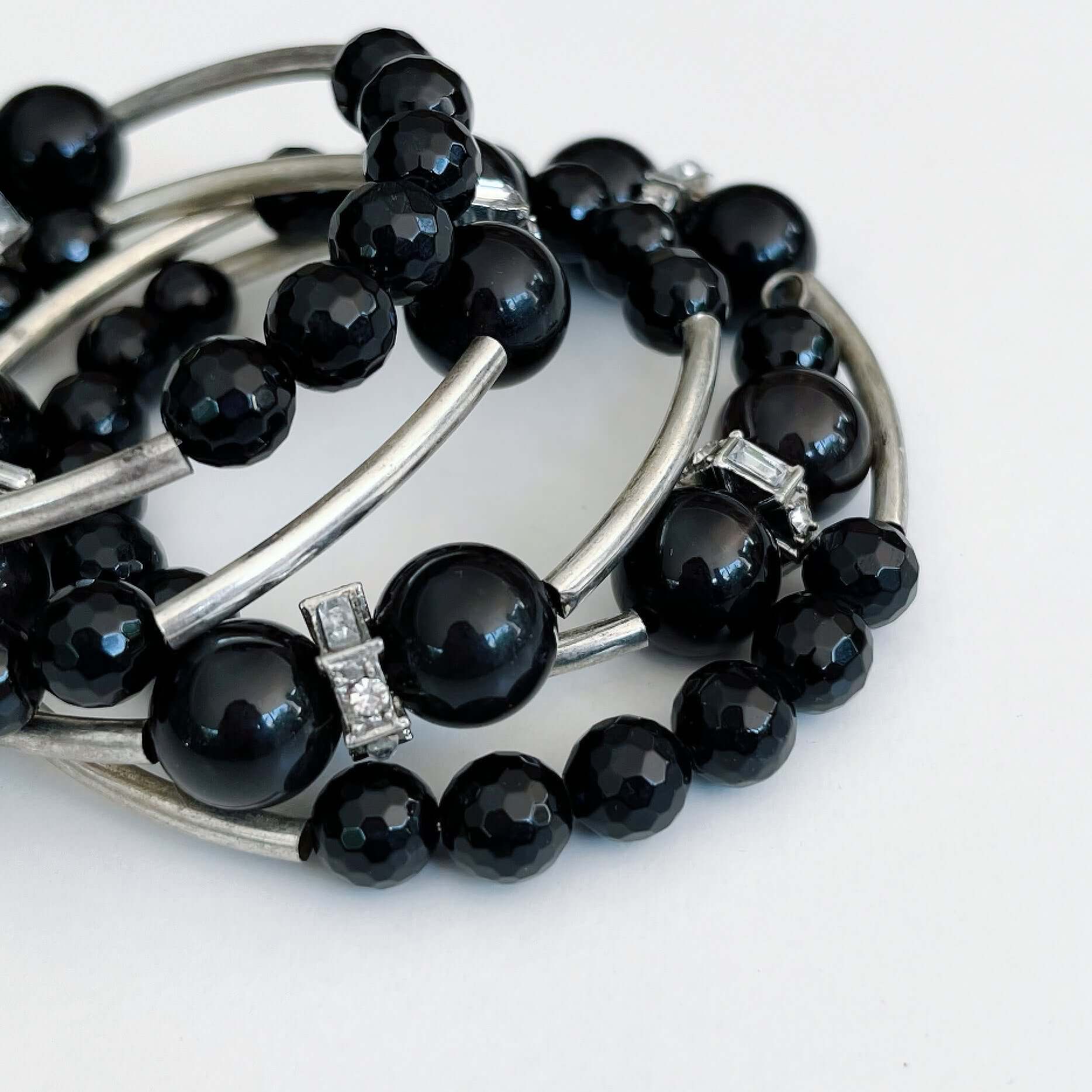 Detail view of Obsidian spiral bracelet.