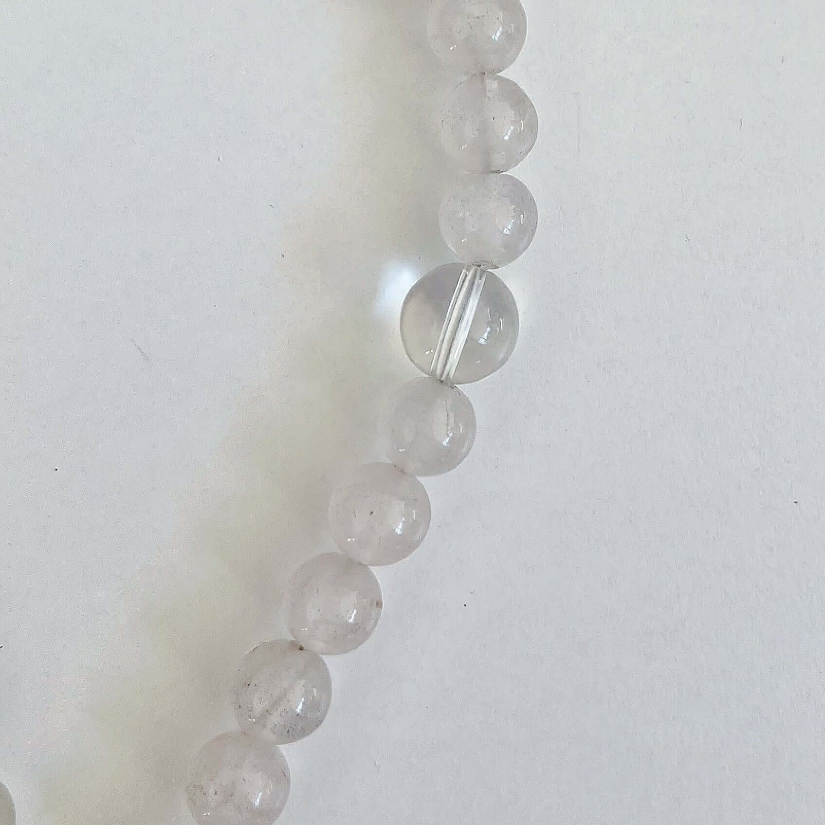 Detail view of the actual Rose Quartz and Clear Quartz beads, the latter is a slightly bigger size.