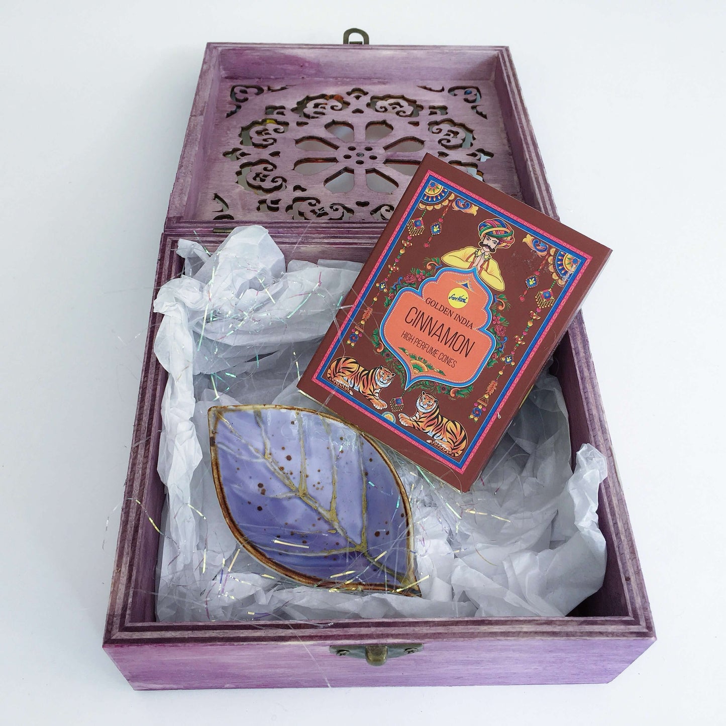 View of box open with contents.