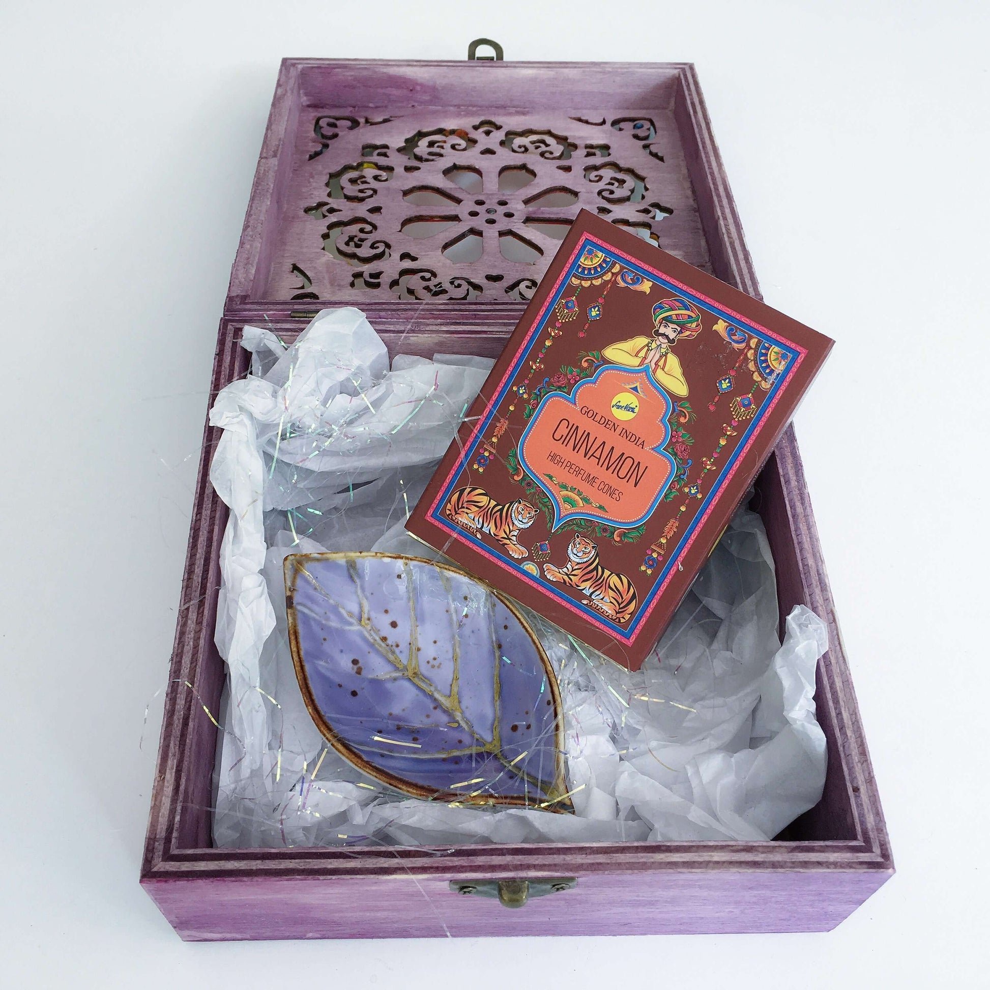 View of box open with contents.