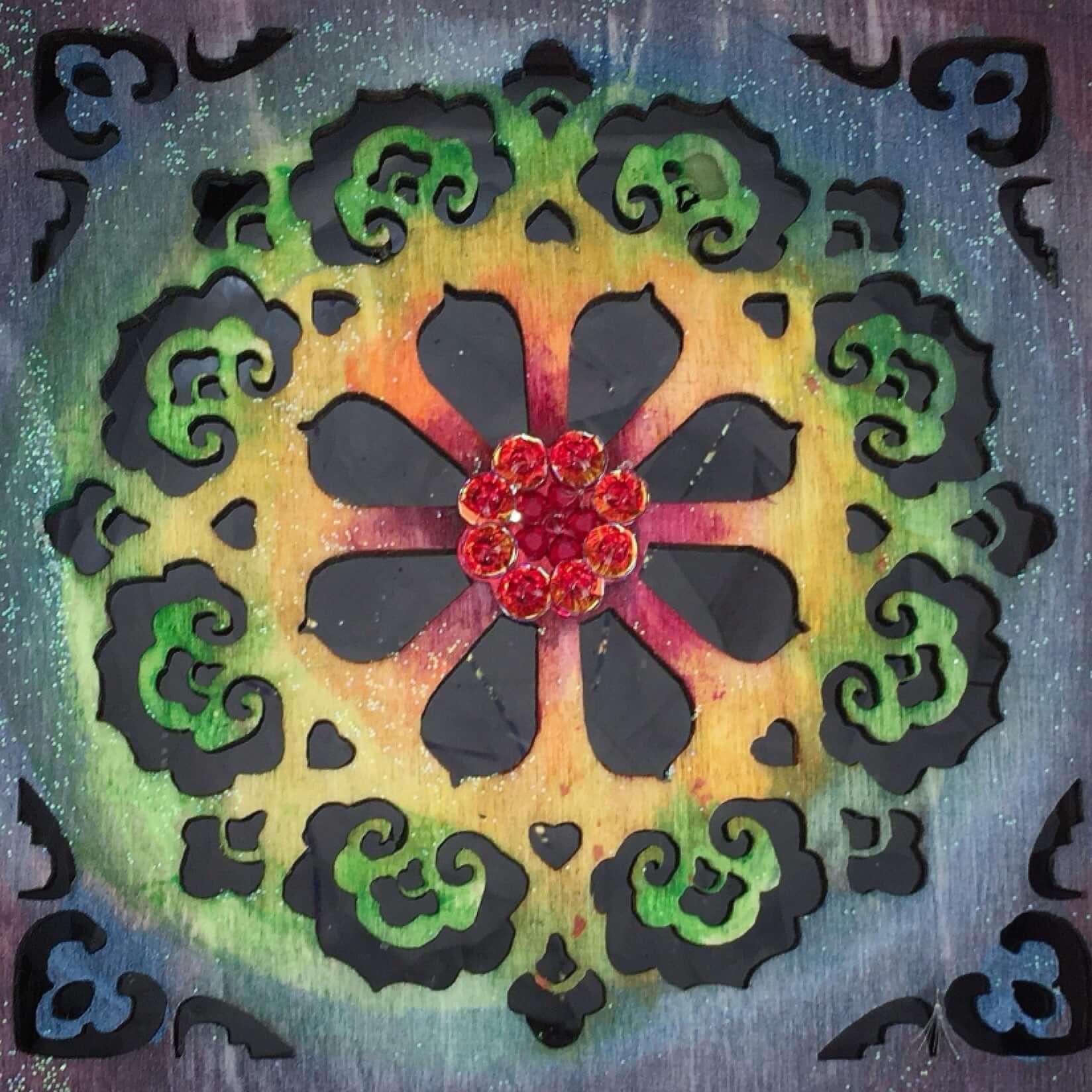 Detail view of rainbow painting fading from purple into red and orange.