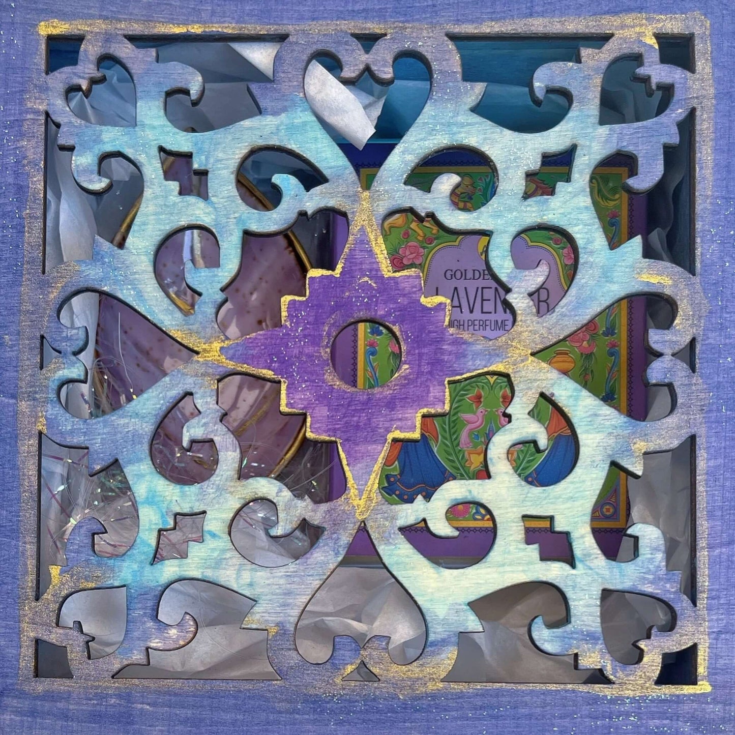 Outside view of lilac painted box, blending into turquoise shades on snowflake shape laser cut lid, metal closing clasp.