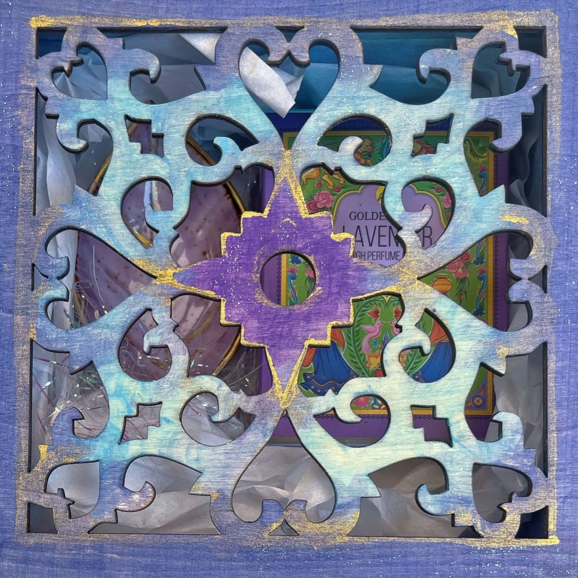 Outside view of lilac painted box, blending into turquoise shades on snowflake shape laser cut lid, metal closing clasp.