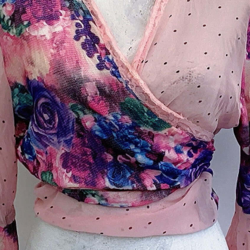 Detail front view, crossover of the georgette over the chiffon, top is tied at the back.