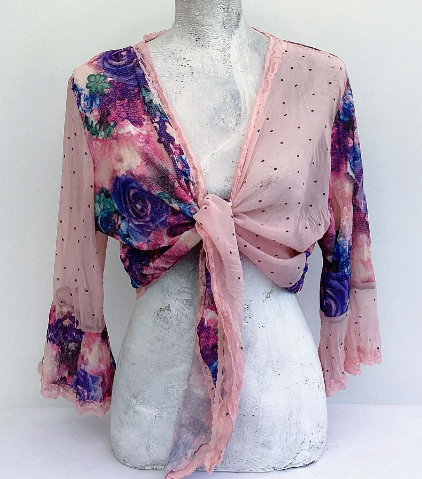 Front view of tie top floral georgette left front and right sleeve, and then pink polka dot left sleeve and right front.