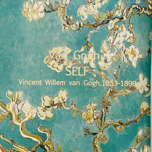 View of almond blossom artwork, showing the title Van Gogh SELF, beneath which it reads Vincent Willem Van Gogh 1853-1890.