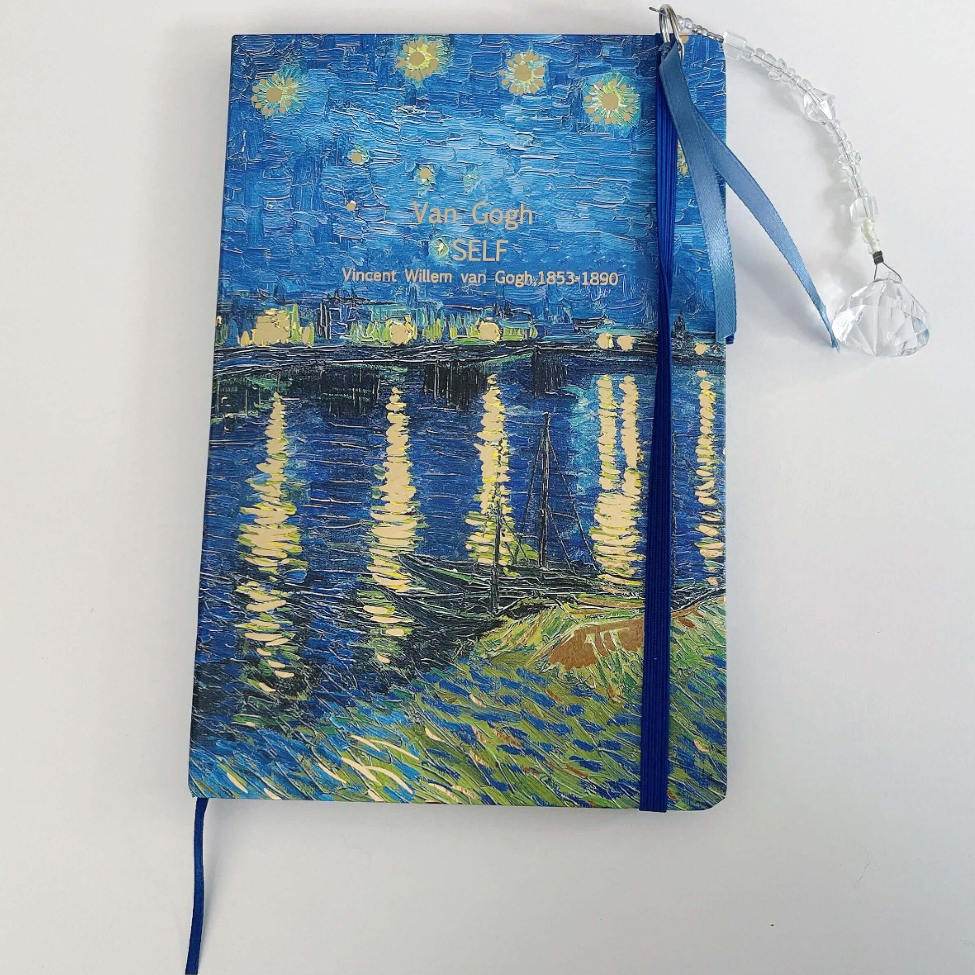 Top view of journal showing both the elasticated book mark and the beaded one.