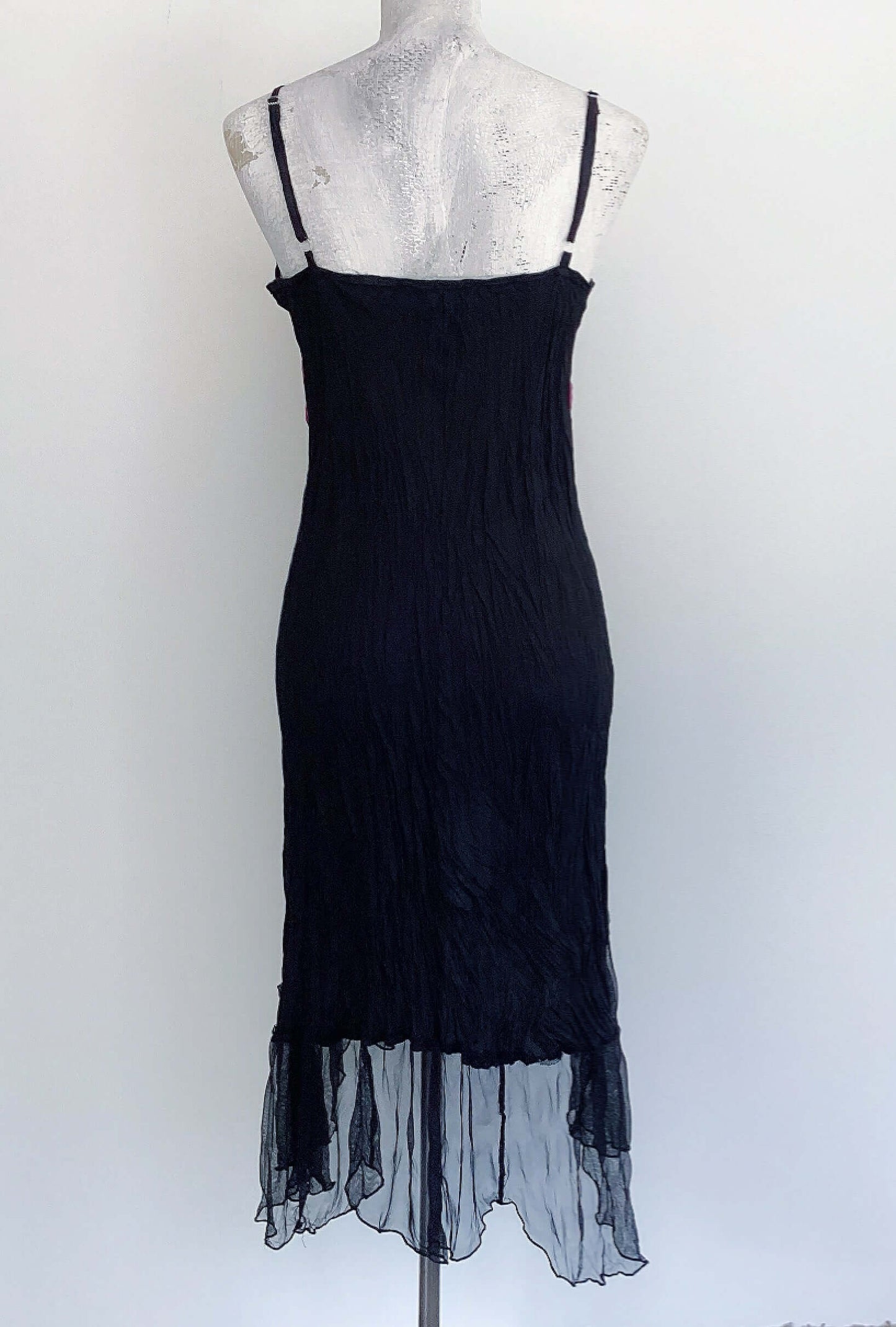 Back view of zingara dress which is plain black.