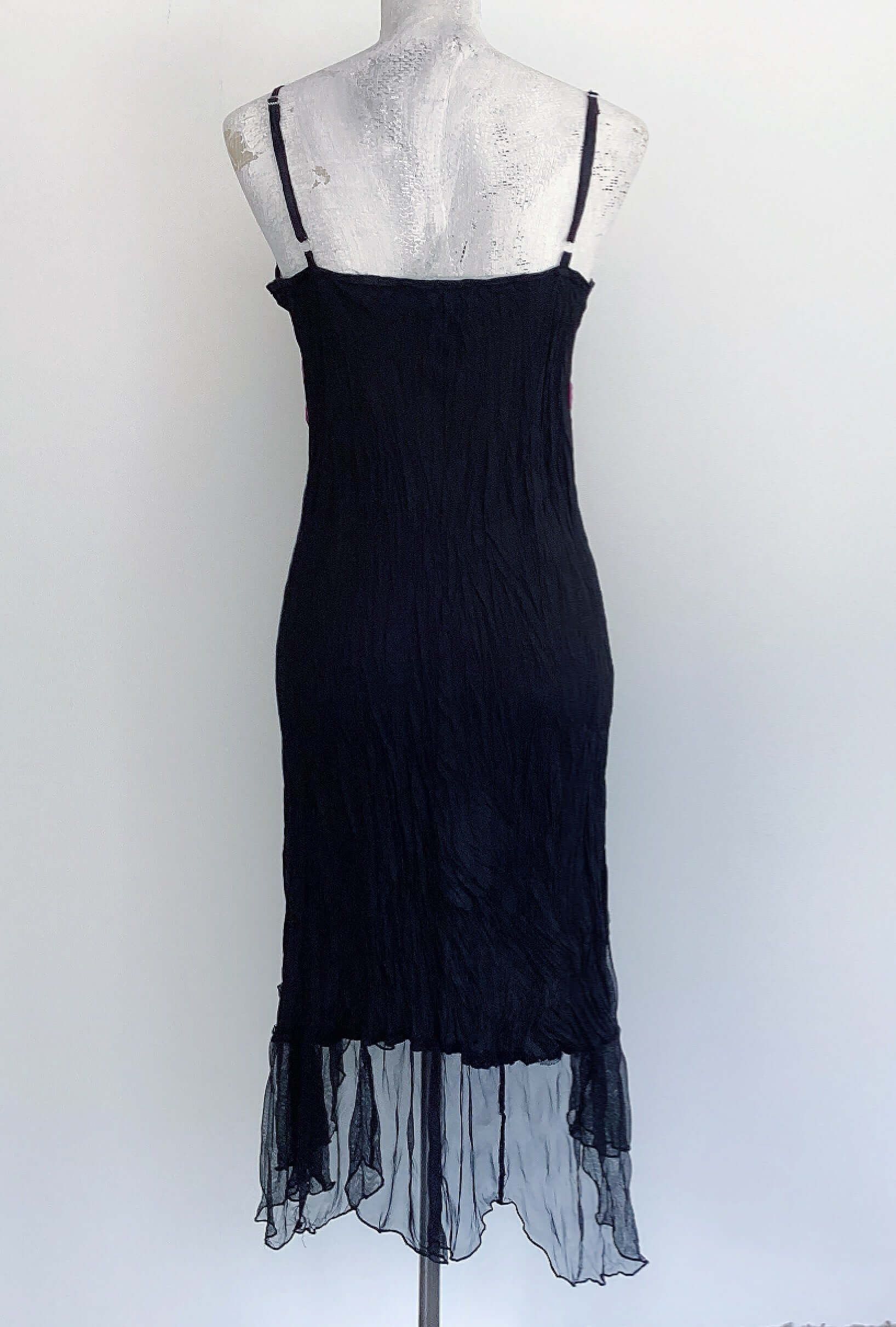 Back view of zingara dress which is plain black.
