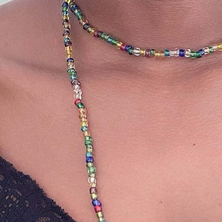 Detailed view of Zulu necklace with multi color translucent beads, approximately 3mm beads.