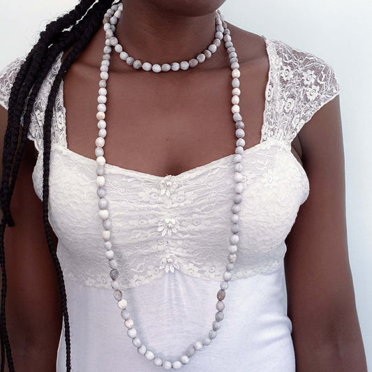 Front view of imfibinga bead necklace worn double wrapped around the neck.